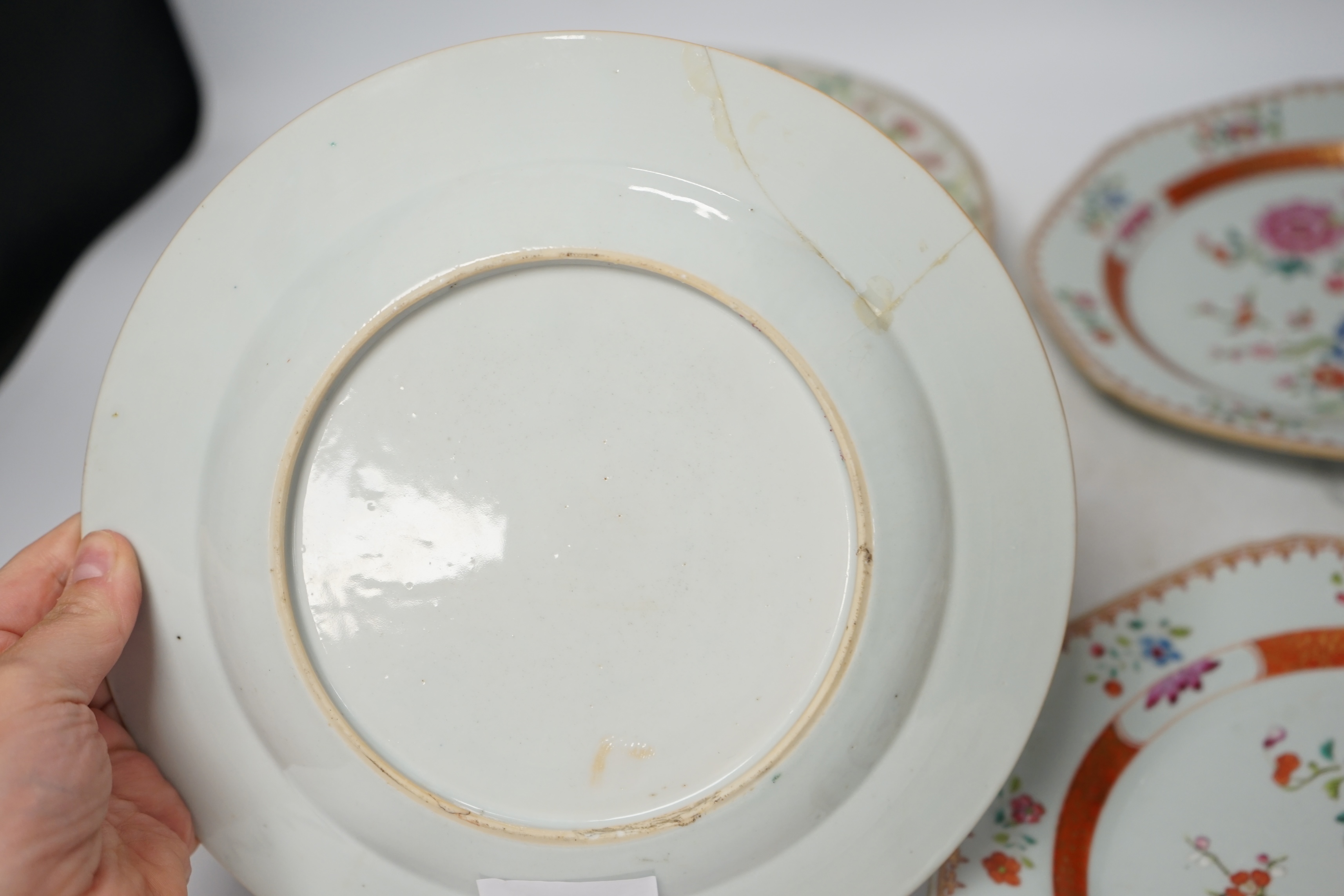 A pair of Chinese famille rose octagonal dishes, one other similar and a Cantonese dish, 18th/19th century, largest 29.5cm (4). Condition - circular famille rose dish with a restored area